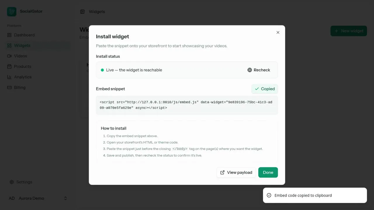 The widget install modal showing the embed snippet to copy.