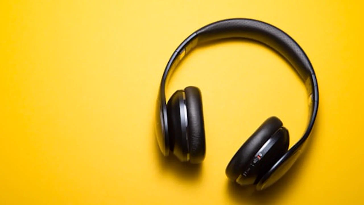A product shot of the Silence Pro headphones on a desk.